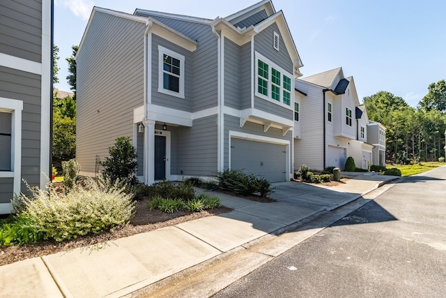 135 Millers Ln, Calhoun, GA 30701 - view of front of house with driveway and a garage