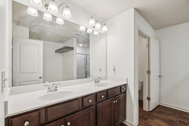 3927 Cannonsgate Ln, Murfreesboro, TN 37128 - full bath with double vanity, wood finished floors, and a shower with door