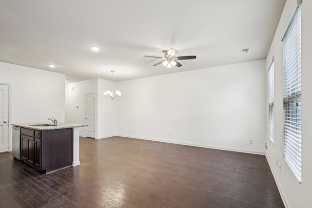 3927 Cannonsgate Ln, Murfreesboro, TN 37128 - kitchen with a chandelier, a ceiling fan, dark wood finished floors, recessed lighting, and dark brown cabinetry