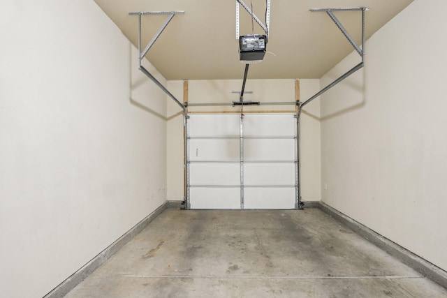 3927 Cannonsgate Ln, Murfreesboro, TN 37128 - garage featuring baseboards and a garage door opener