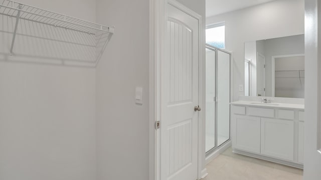 4906 Mowbray Way, Murfreesboro, TN 37129 - full bathroom featuring a shower stall, vanity, a walk in closet, and tile patterned floors