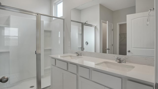 4906 Mowbray Way, Murfreesboro, TN 37129 - bathroom featuring a stall shower, double vanity, and a walk in closet