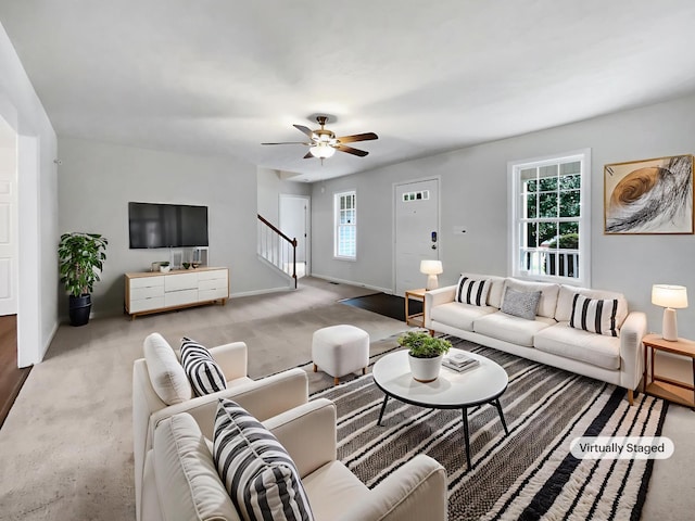 2919 Sams Ct, Spring Hill, TN 37174 - carpeted living room with stairway and a ceiling fan