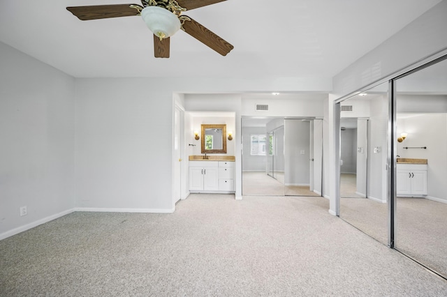 1900 Richard Jones Rd Unit X2, Nashville, TN 37215 - unfurnished bedroom featuring light colored carpet, ensuite bathroom, and ceiling fan