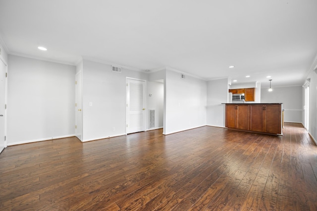 1900 Richard Jones Rd Unit X2, Nashville, TN 37215 - unfurnished living room with dark wood-type flooring, recessed lighting, and crown molding