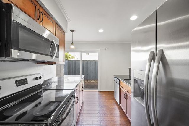1900 Richard Jones Rd Unit X2, Nashville, TN 37215 - kitchen featuring appliances with stainless steel finishes, crown molding, dark wood-type flooring, brown cabinets, and recessed lighting
