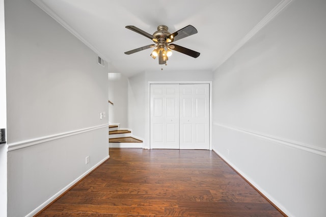 1900 Richard Jones Rd Unit X2, Nashville, TN 37215 - unfurnished bedroom featuring crown molding, a closet, wood finished floors, and a ceiling fan