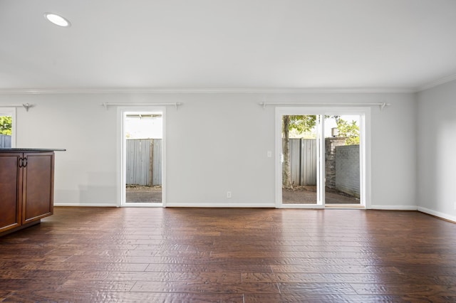 1900 Richard Jones Rd Unit X2, Nashville, TN 37215 - unfurnished living room with ornamental molding, dark wood finished floors, and recessed lighting