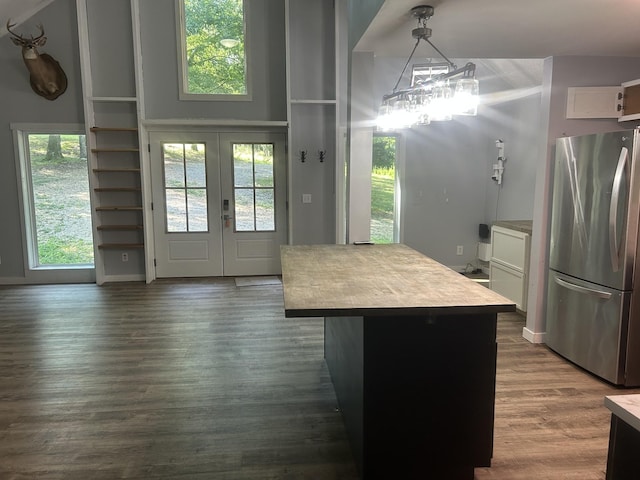 370 Alpine Rd, Camden, TN 38320 - kitchen featuring freestanding refrigerator, french doors, light countertops, dark wood-style floors, and white cabinetry