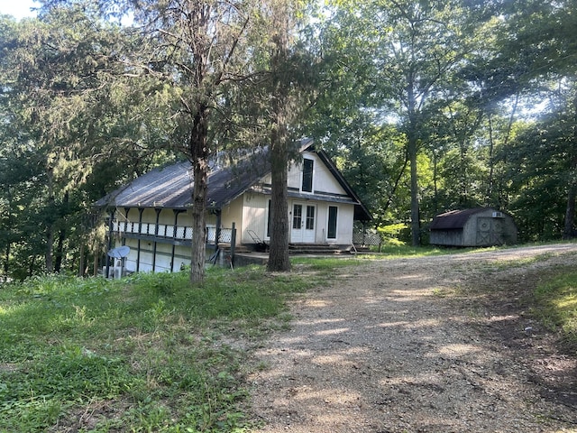 370 Alpine Rd, Camden, TN 38320 - view of property exterior with a shed and driveway