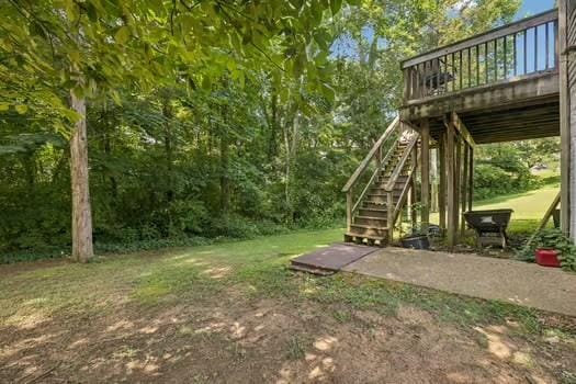 1604 Yarmouth Ct, Old Hickory, TN 37138 - view of yard featuring stairs and a wooden deck