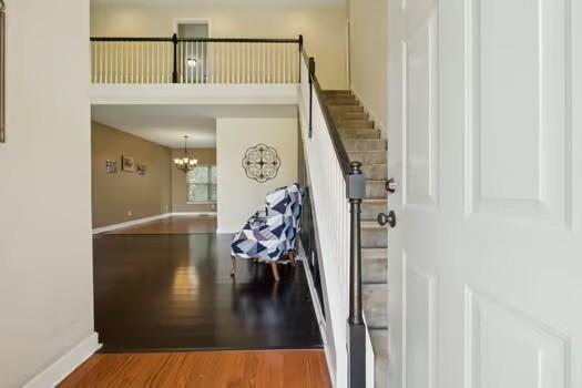 1604 Yarmouth Ct, Old Hickory, TN 37138 - foyer with wood finished floors, a chandelier, and stairway