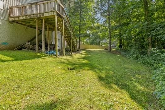 1604 Yarmouth Ct, Old Hickory, TN 37138 - view of grassy yard featuring a deck