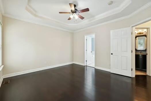 1604 Yarmouth Ct, Old Hickory, TN 37138 - unfurnished bedroom with ornamental molding, a raised ceiling, dark wood-style flooring, ensuite bath, and ceiling fan