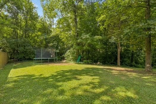 1604 Yarmouth Ct, Old Hickory, TN 37138 - view of yard featuring a trampoline