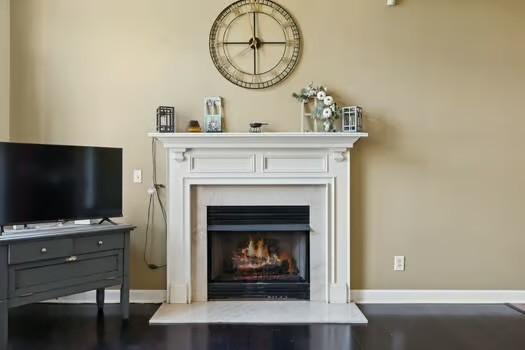 1604 Yarmouth Ct, Old Hickory, TN 37138 - detailed view of a lit fireplace and baseboards