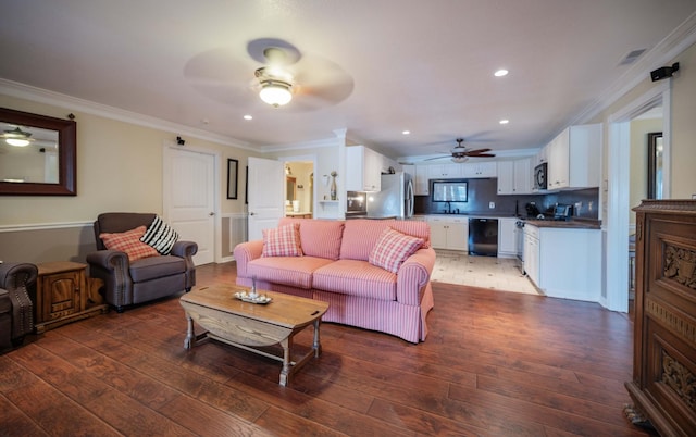 627 Eastbrook Rd, Estill Springs, TN 37330 - living room featuring a ceiling fan, light wood-style flooring, ornamental molding, and recessed lighting