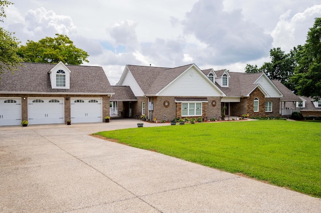 627 Eastbrook Rd, Estill Springs, TN 37330 - view of front of home featuring roof with shingles, brick siding, and a front yard