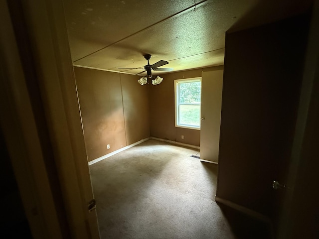 211 Pinetree Rd, Sewanee, TN 37375 - carpeted empty room featuring a ceiling fan and a textured ceiling