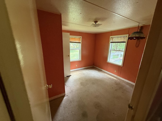 211 Pinetree Rd, Sewanee, TN 37375 - empty room featuring concrete floors and a textured ceiling