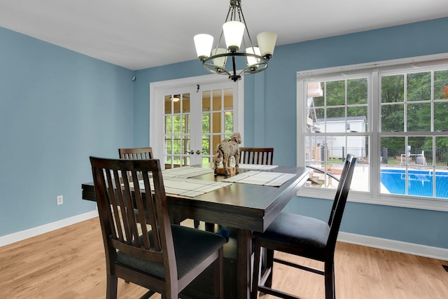 6685 Lynchburg Rd, Winchester, TN 37398 - dining space featuring a chandelier, healthy amount of natural light, and light wood finished floors