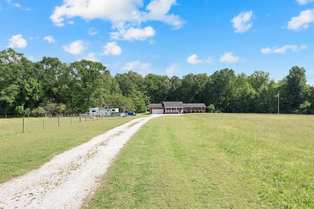 6685 Lynchburg Rd, Winchester, TN 37398 - view of dirt / gravel road featuring a view of countryside and a wooded view