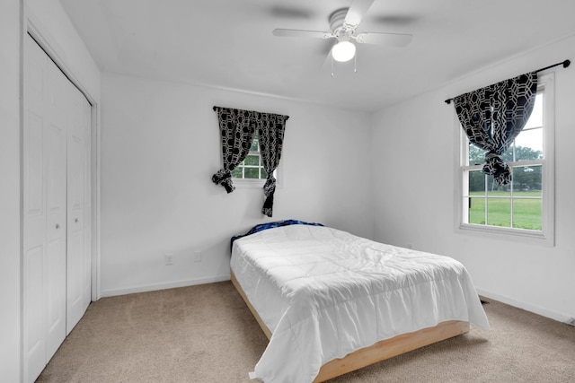 6685 Lynchburg Rd, Winchester, TN 37398 - carpeted bedroom with a closet and a ceiling fan