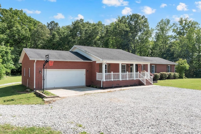 6685 Lynchburg Rd, Winchester, TN 37398 - ranch-style home featuring a porch, driveway, an attached garage, and roof with shingles