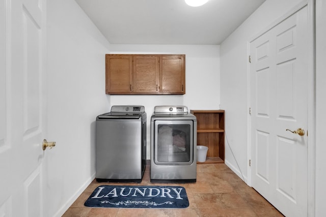 6685 Lynchburg Rd, Winchester, TN 37398 - laundry area featuring washing machine and dryer and cabinet space