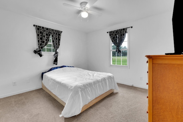 6685 Lynchburg Rd, Winchester, TN 37398 - carpeted bedroom with multiple windows and ceiling fan