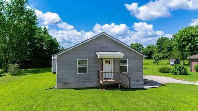 516 Davis St, Cowan, TN 37318 - back of house featuring crawl space, a lawn, and driveway