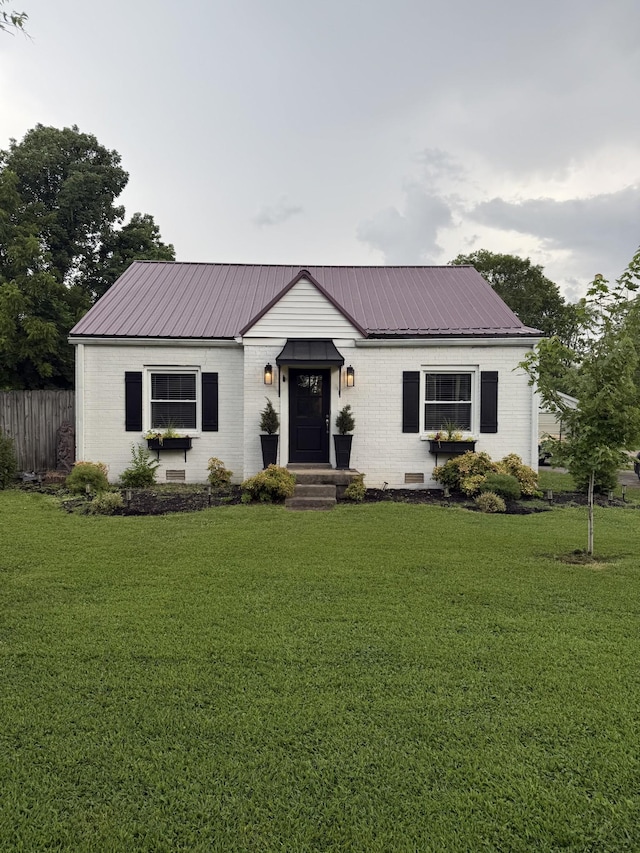 140 N Tarver Ave, Lebanon, TN 37087 - view of front of home featuring a metal roof and brick siding