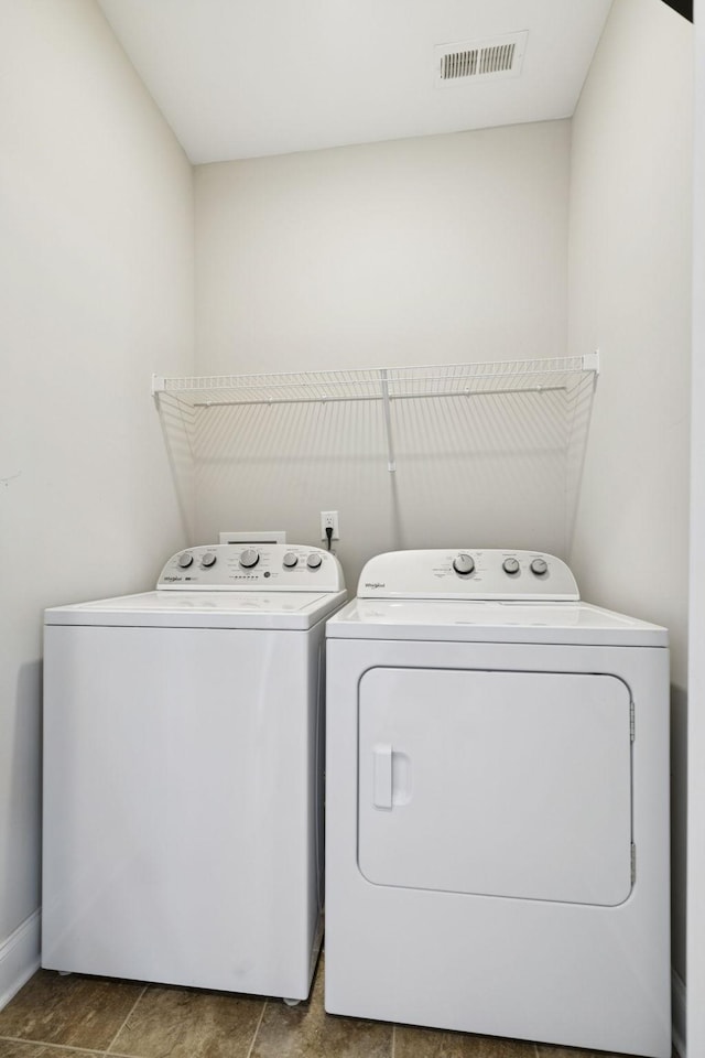 2237 Pathfinder Dr, Murfreesboro, TN 37127 - laundry area with washing machine and dryer and baseboards