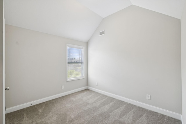 2237 Pathfinder Dr, Murfreesboro, TN 37127 - carpeted empty room with vaulted ceiling and baseboards