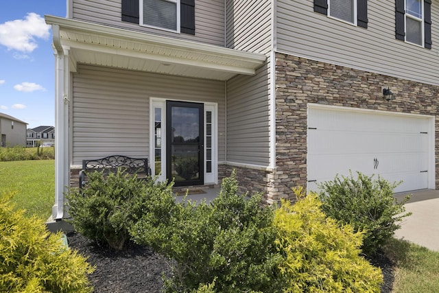 2237 Pathfinder Dr, Murfreesboro, TN 37127 - entrance to property featuring stone siding and an attached garage