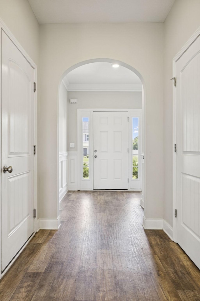 2237 Pathfinder Dr, Murfreesboro, TN 37127 - entryway featuring arched walkways, wood finished floors, and ornamental molding