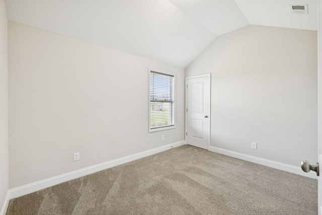 2237 Pathfinder Dr, Murfreesboro, TN 37127 - spare room featuring lofted ceiling and carpet
