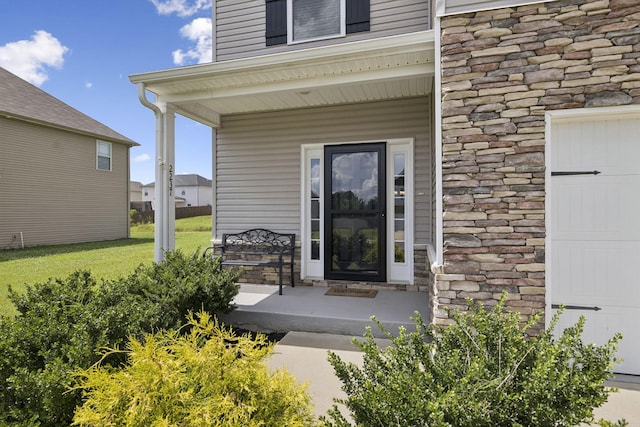 2237 Pathfinder Dr, Murfreesboro, TN 37127 - entrance to property with a porch, stone siding, and a yard