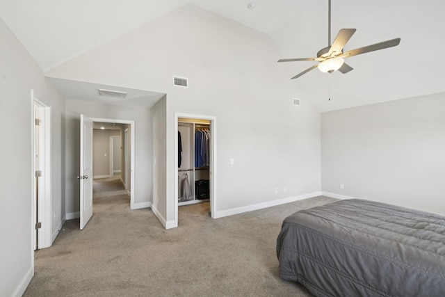 2237 Pathfinder Dr, Murfreesboro, TN 37127 - bedroom with high vaulted ceiling, carpet, a walk in closet, and ceiling fan