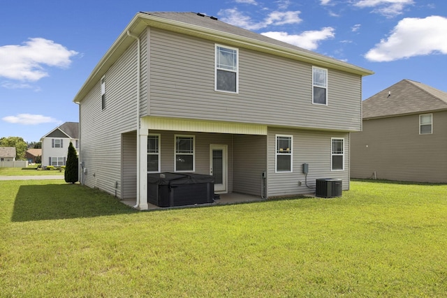 2237 Pathfinder Dr, Murfreesboro, TN 37127 - back of property with a hot tub and a lawn