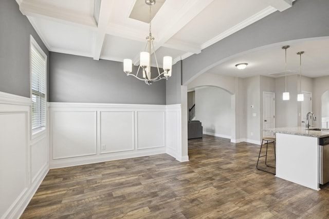 2237 Pathfinder Dr, Murfreesboro, TN 37127 - unfurnished dining area with a decorative wall, arched walkways, beam ceiling, dark wood finished floors, and coffered ceiling