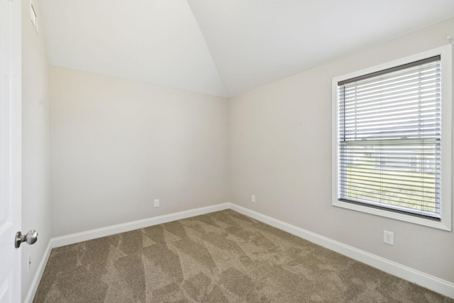 2237 Pathfinder Dr, Murfreesboro, TN 37127 - spare room featuring carpet floors and vaulted ceiling