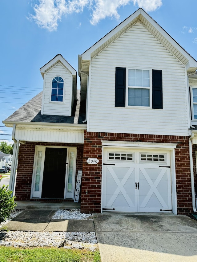 3040 Denny Brooke Ln, Smyrna, TN 37167 - view of front of home featuring a garage, brick siding, concrete driveway, and a shingled roof