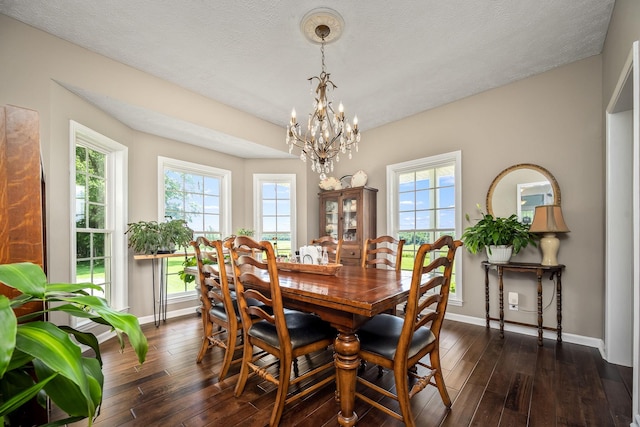 702 John Windrow Rd, Eagleville, TN 37060 - dining space with a chandelier, dark wood-style flooring, plenty of natural light, and a textured ceiling