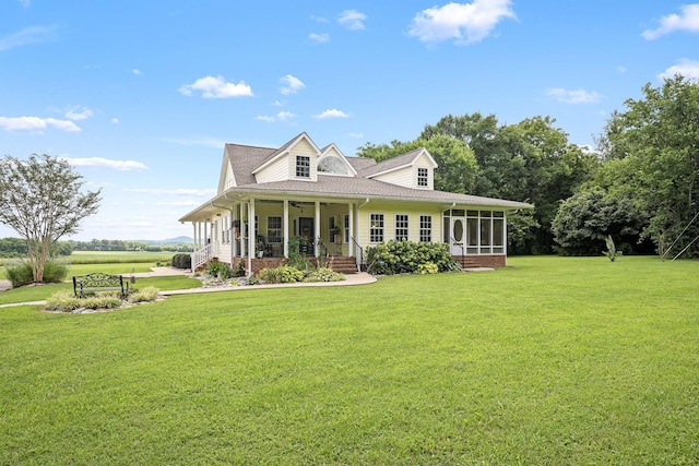 702 John Windrow Rd, Eagleville, TN 37060 - farmhouse-style home featuring a sunroom, a front yard, a porch, and a shingled roof