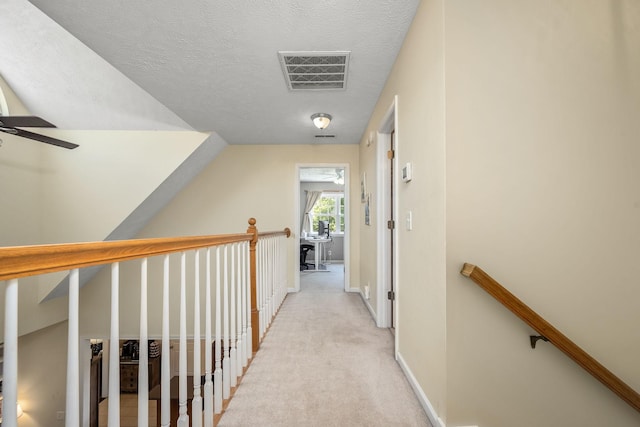 702 John Windrow Rd, Eagleville, TN 37060 - hall with an upstairs landing, a textured ceiling, and light carpet