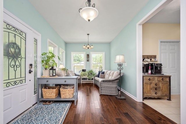 702 John Windrow Rd, Eagleville, TN 37060 - foyer with a chandelier and dark wood-style flooring