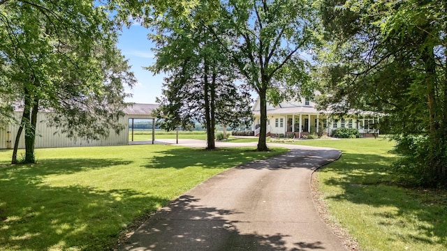 702 John Windrow Rd, Eagleville, TN 37060 - view of home's community featuring a lawn