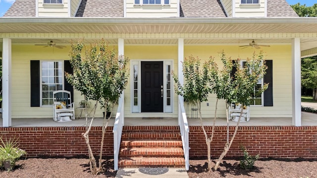 702 John Windrow Rd, Eagleville, TN 37060 - doorway to property with ceiling fan, a porch, and roof with shingles