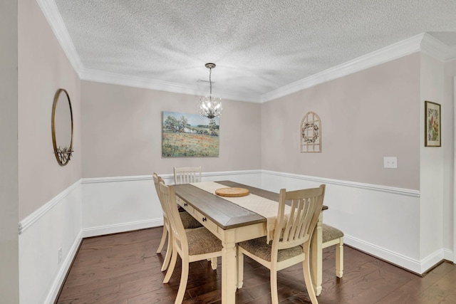 914 E Northfield Blvd, Murfreesboro, TN 37130 - dining area featuring a chandelier, a textured ceiling, wood finished floors, crown molding, and wainscoting